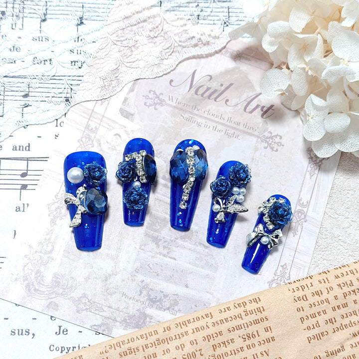 Glamorous artificial nails with floral decoration Stornfield