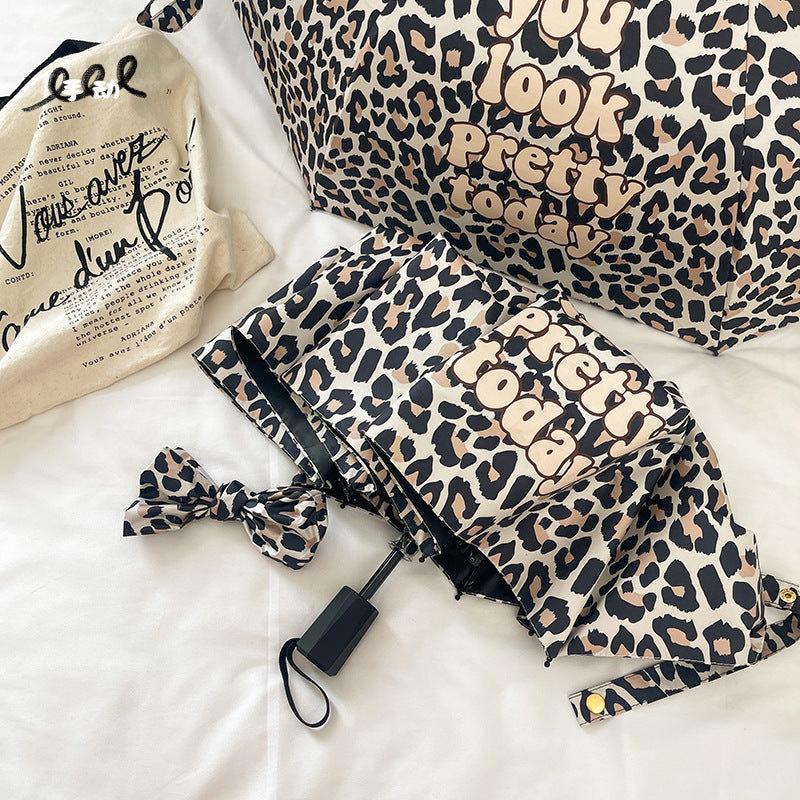 Women's Foldable Umbrella with Dynamic Leopard Pattern Stornfield