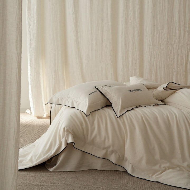 Reversible Linen-Blend Duvet Cover Set with Contrasting Piped Edge and Pillow Shams