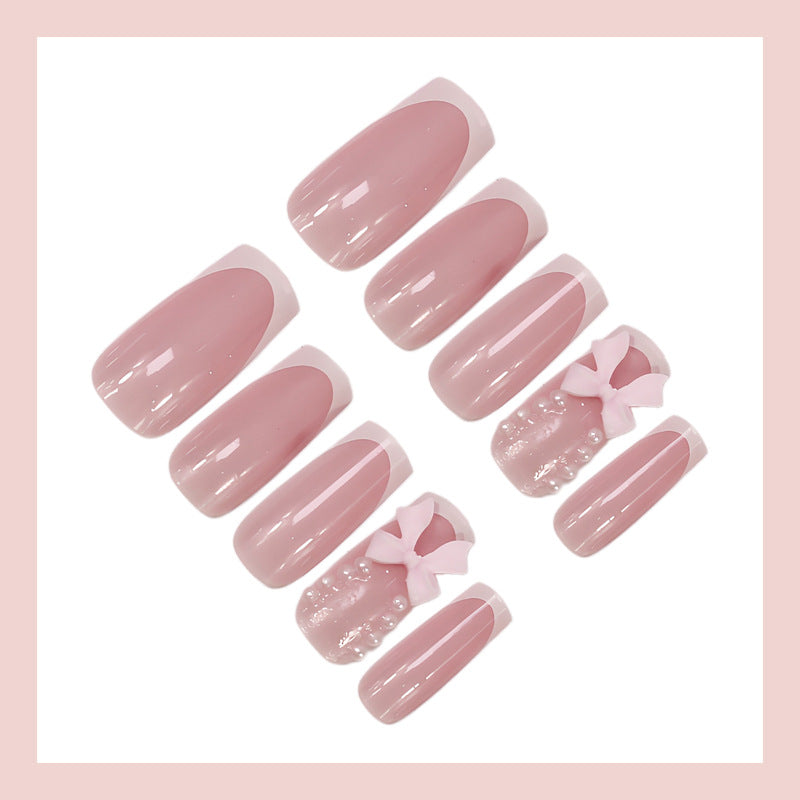 Acrylic nail set with trendy 3D decorations and elegant accents Stornfield