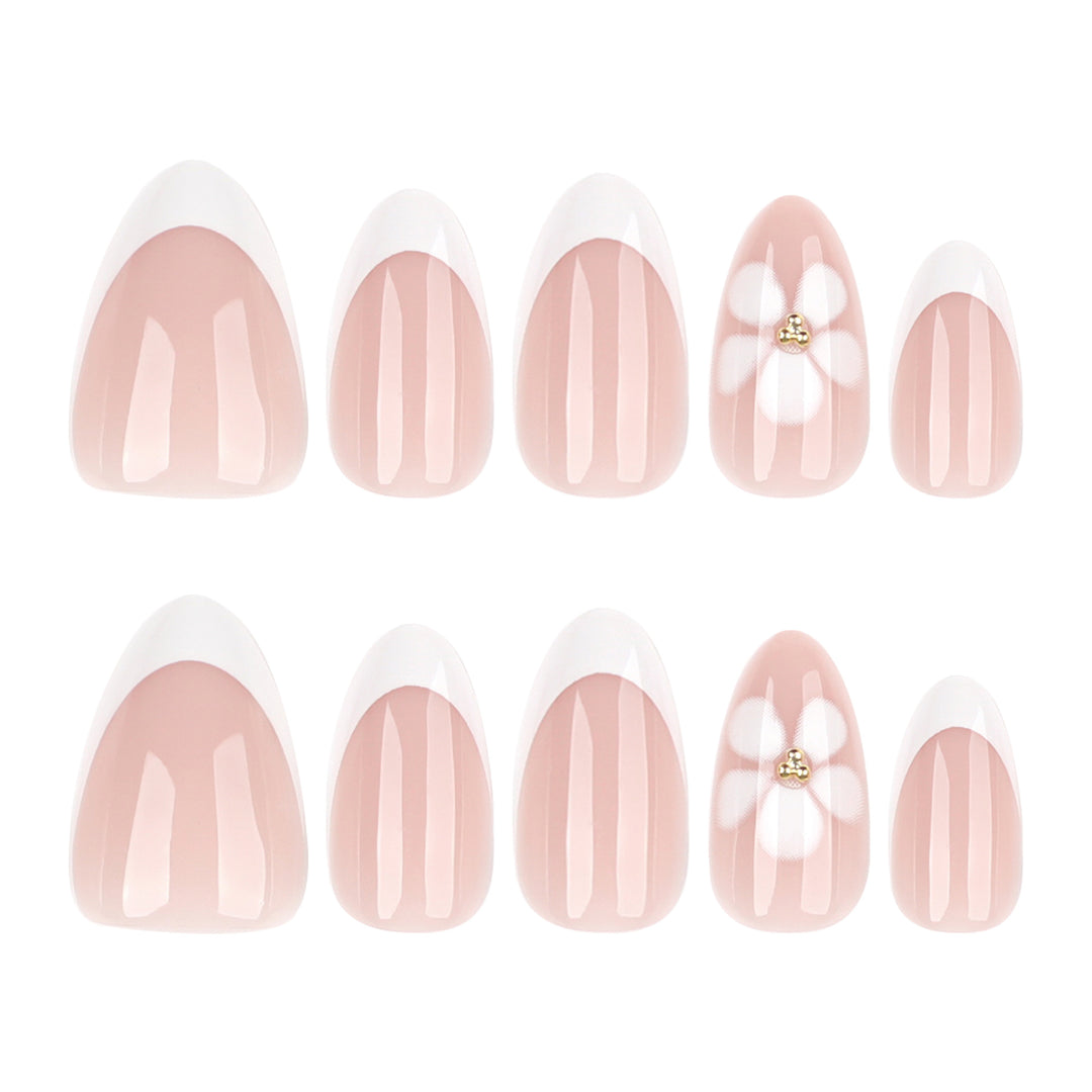 Artful nail extensions with flower design and elegant French tips Stornfield