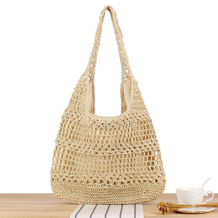 Handbag with floral appliqué Made of natural material Stornfield