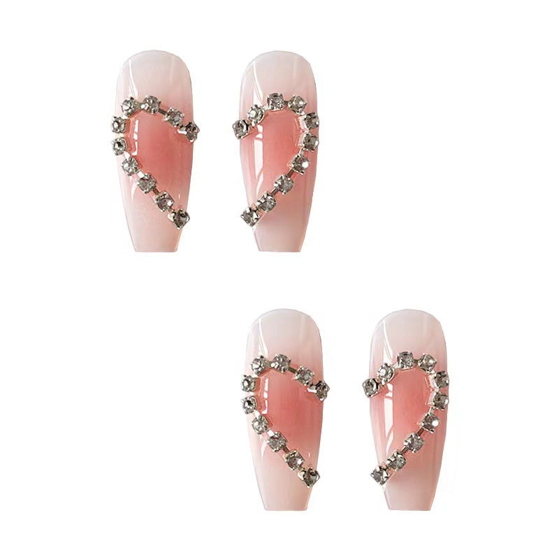 Artistic gel nails with heart accents Stornfield