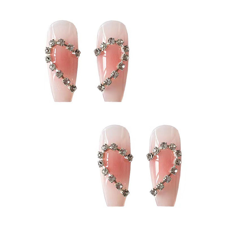 Artistic gel nails with heart accents Stornfield
