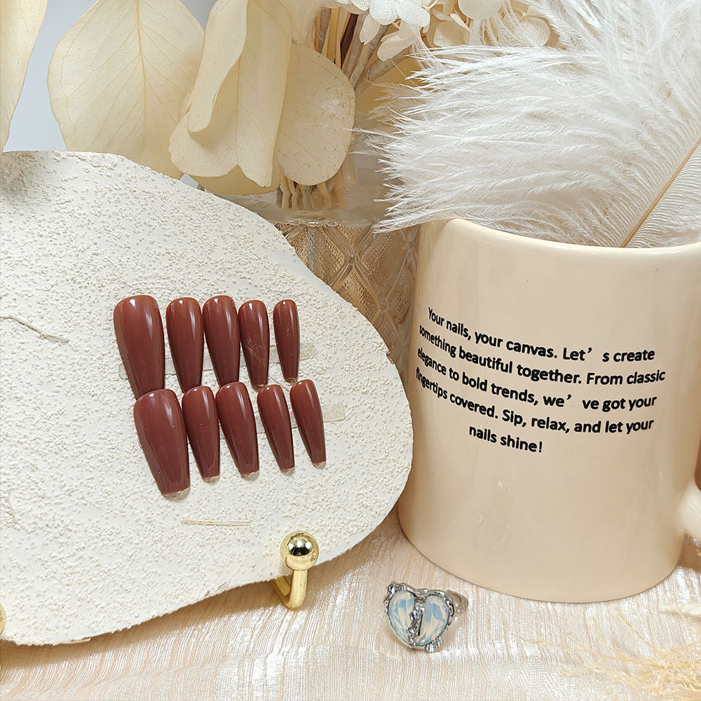 Artificial nails in elegant high gloss with stiletto shape Stornfield