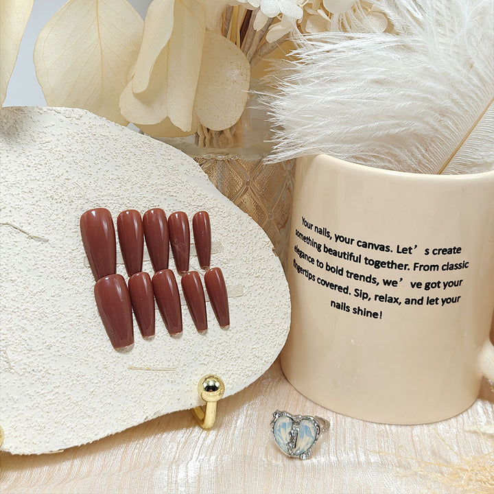 Artificial nails in elegant high gloss with stiletto shape Stornfield