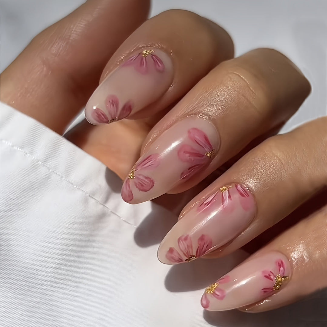 Artificial nail set with floral accents and gold embellishments Stornfield