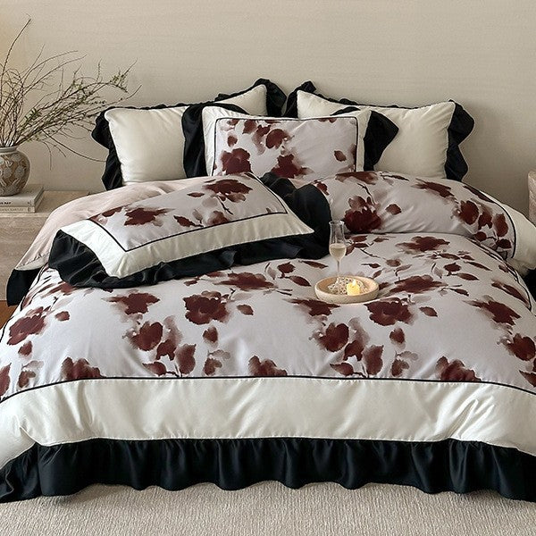 Luxury bed cover set made of cotton satin with abstract watercolor flower print and contrasting ruffle