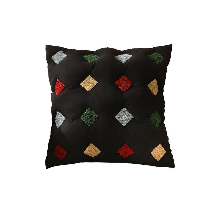 Filled decorative cushion with colorful tuft diamonds and padded structure