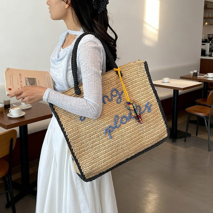 Spacious straw shopping bag with lettering Stornfield