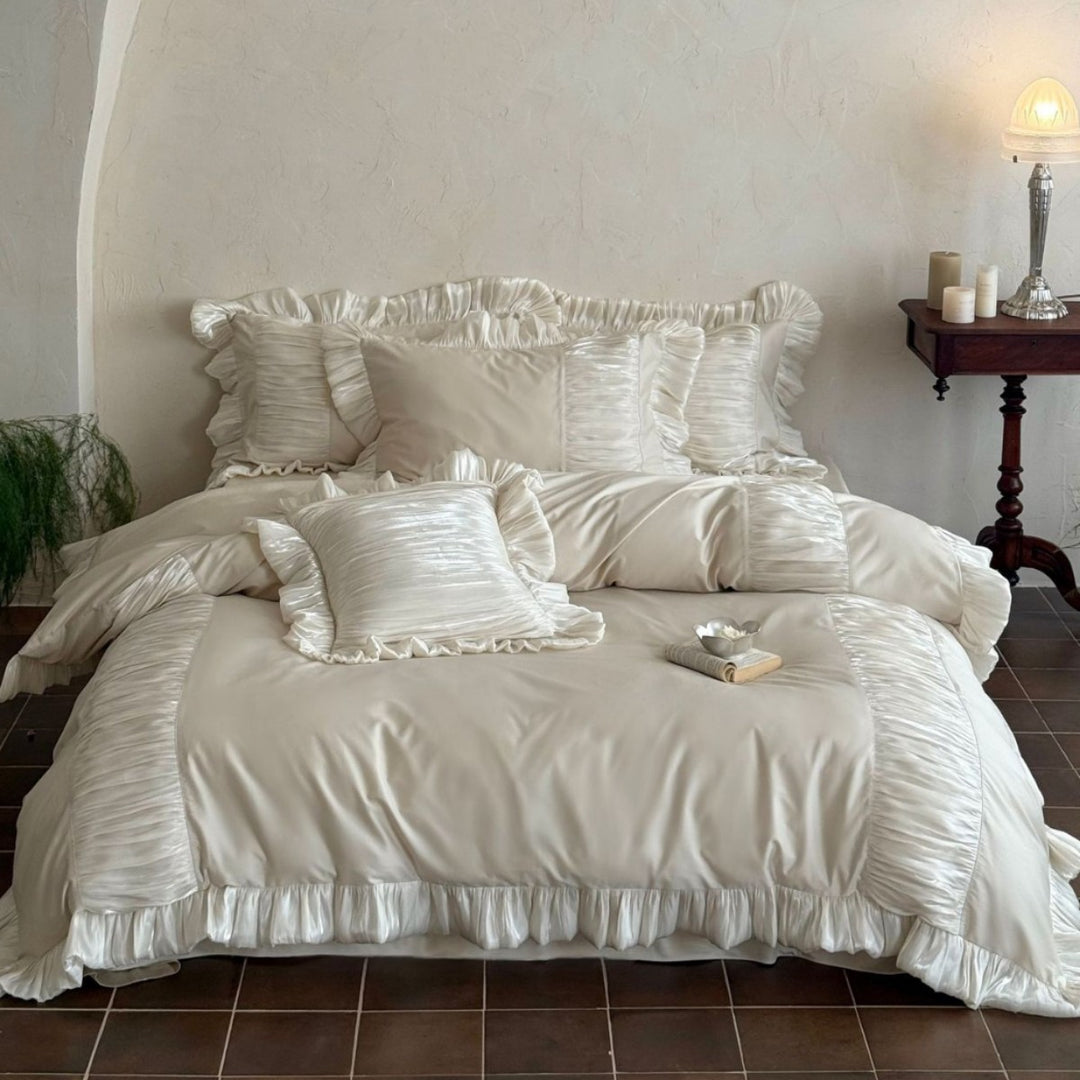Romantic satin bedding set with ruffles and pleated inserts