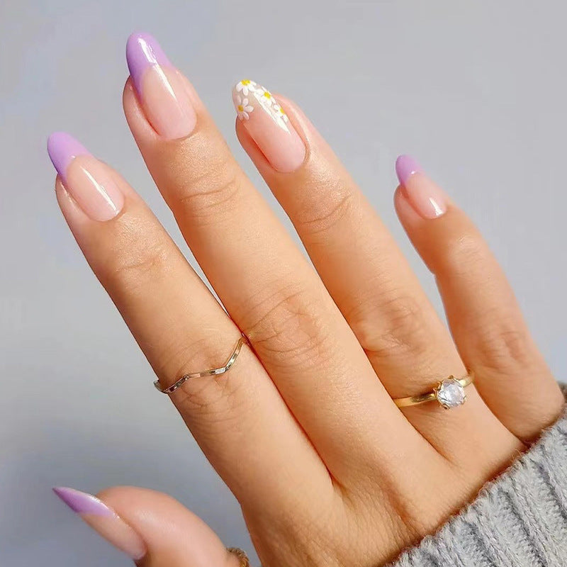 Artful nail extensions with an elegant leaf pattern Stornfield