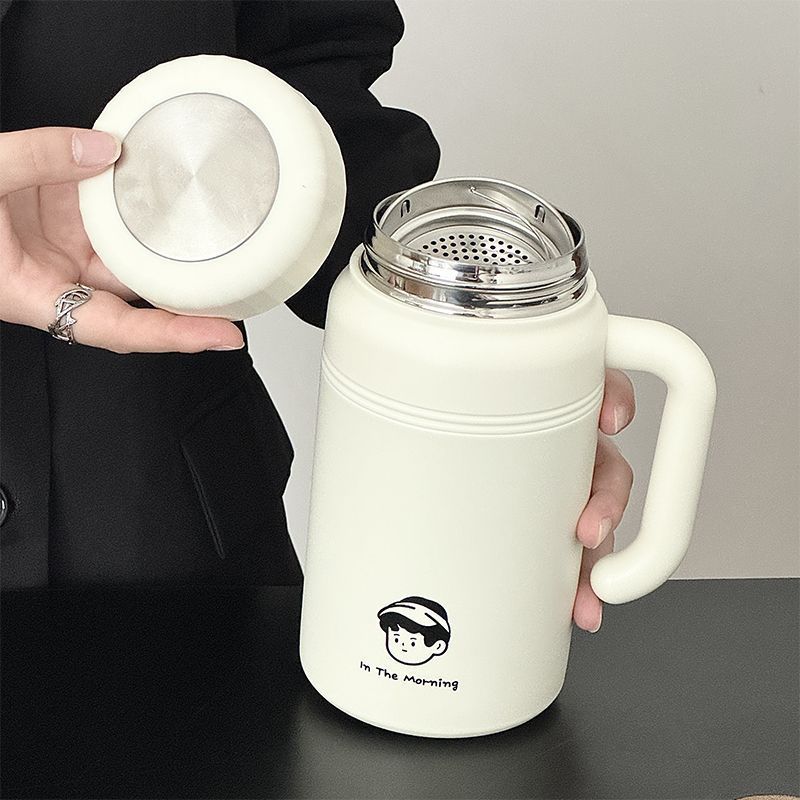 Women’s insulated carafe with ergonomic carrying handle and innovative closure system Stornfield