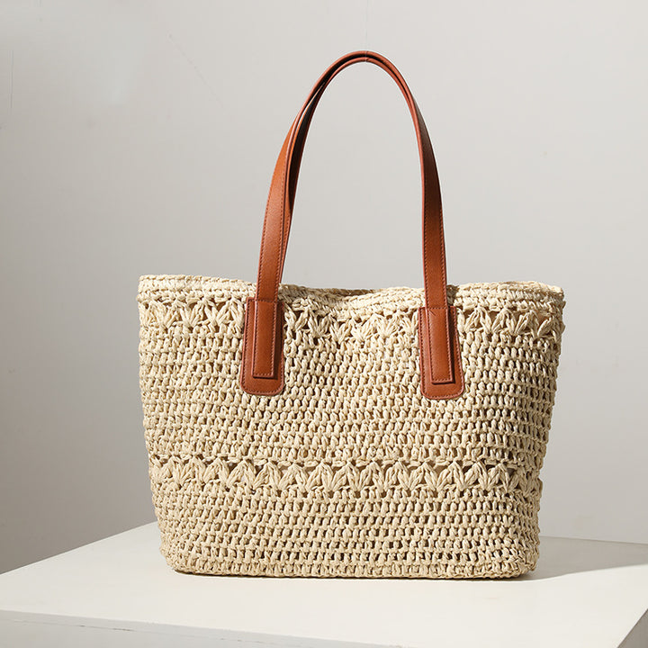 Braided straw bag with sturdy leather handles Stornfield