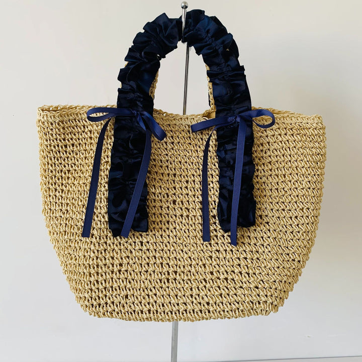 Crocheted beach bag with elegant satin accents Stornfield