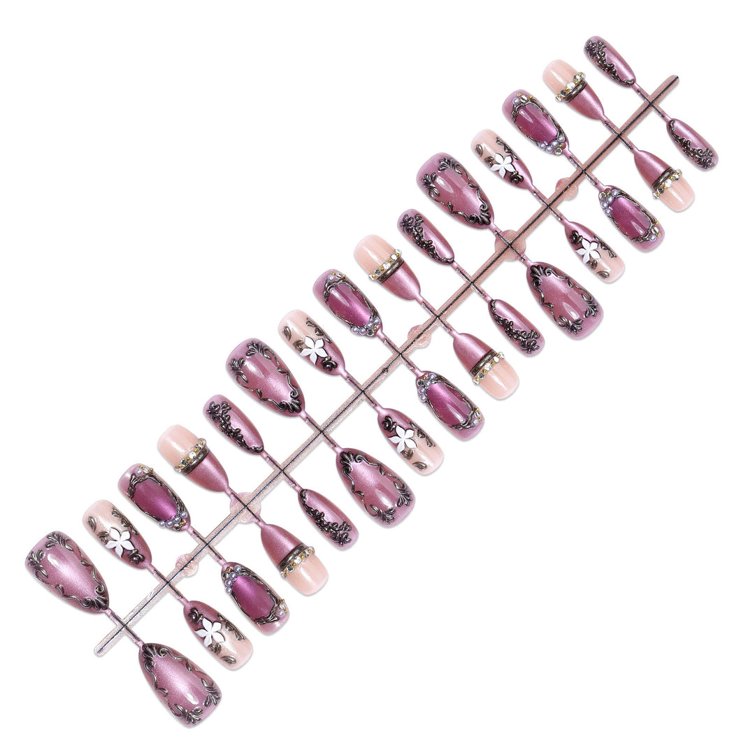 Acrylic nail set with floral design and glamorous accents Stornfield