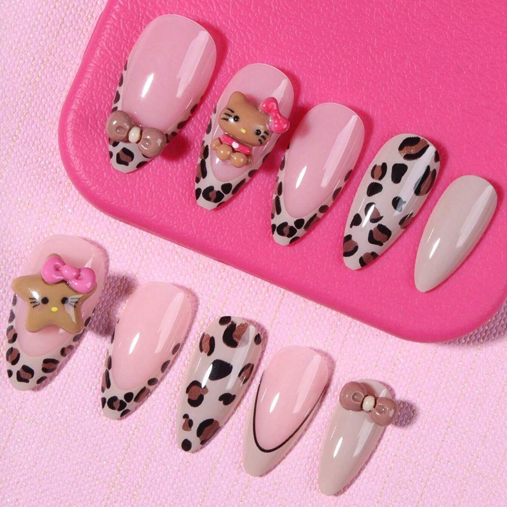 Artificial nail set with playful animal motifs and glitter accents Stornfield