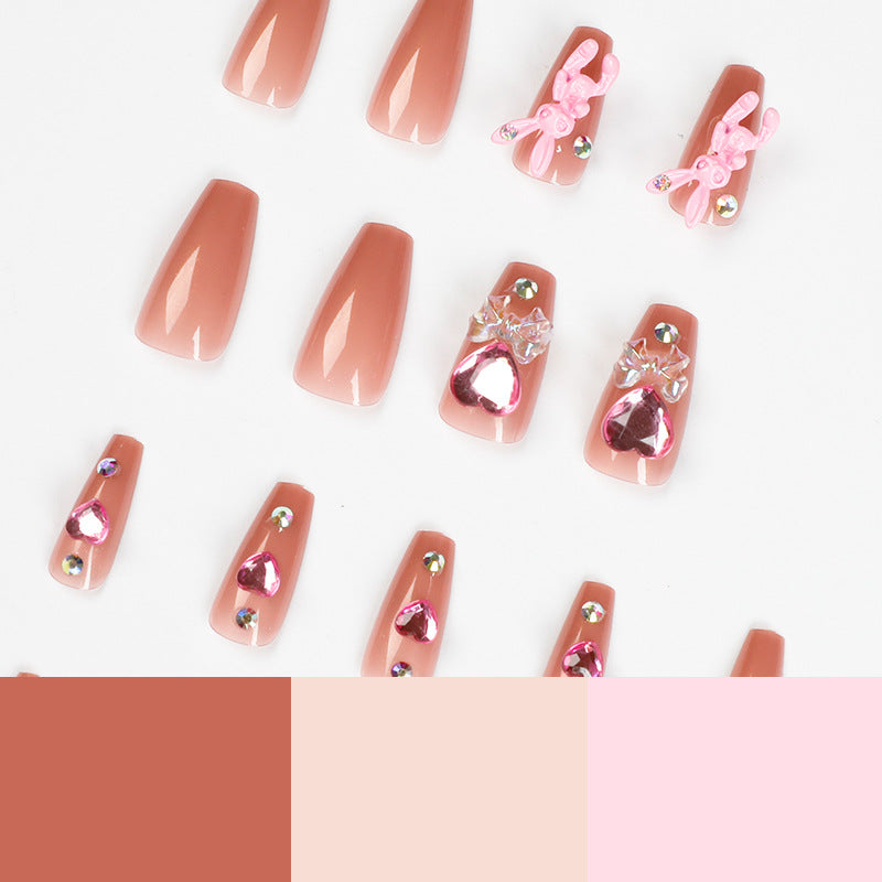 Artificial nail extensions with artistic decorations Stornfield
