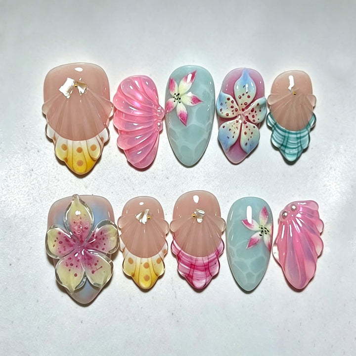 Artistic Press-On Nail Set with Floral and Shell Designs