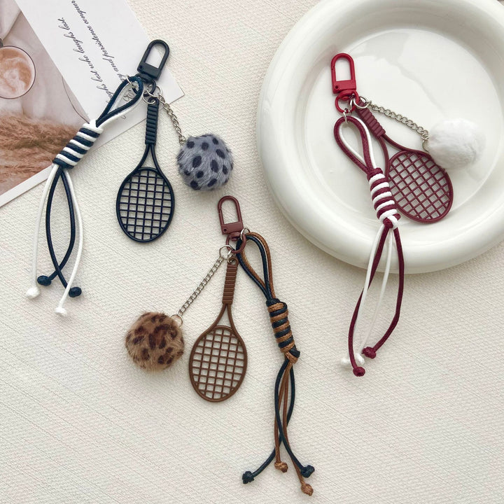 Tennis Racket and Fur Ball Keychain Stornfield