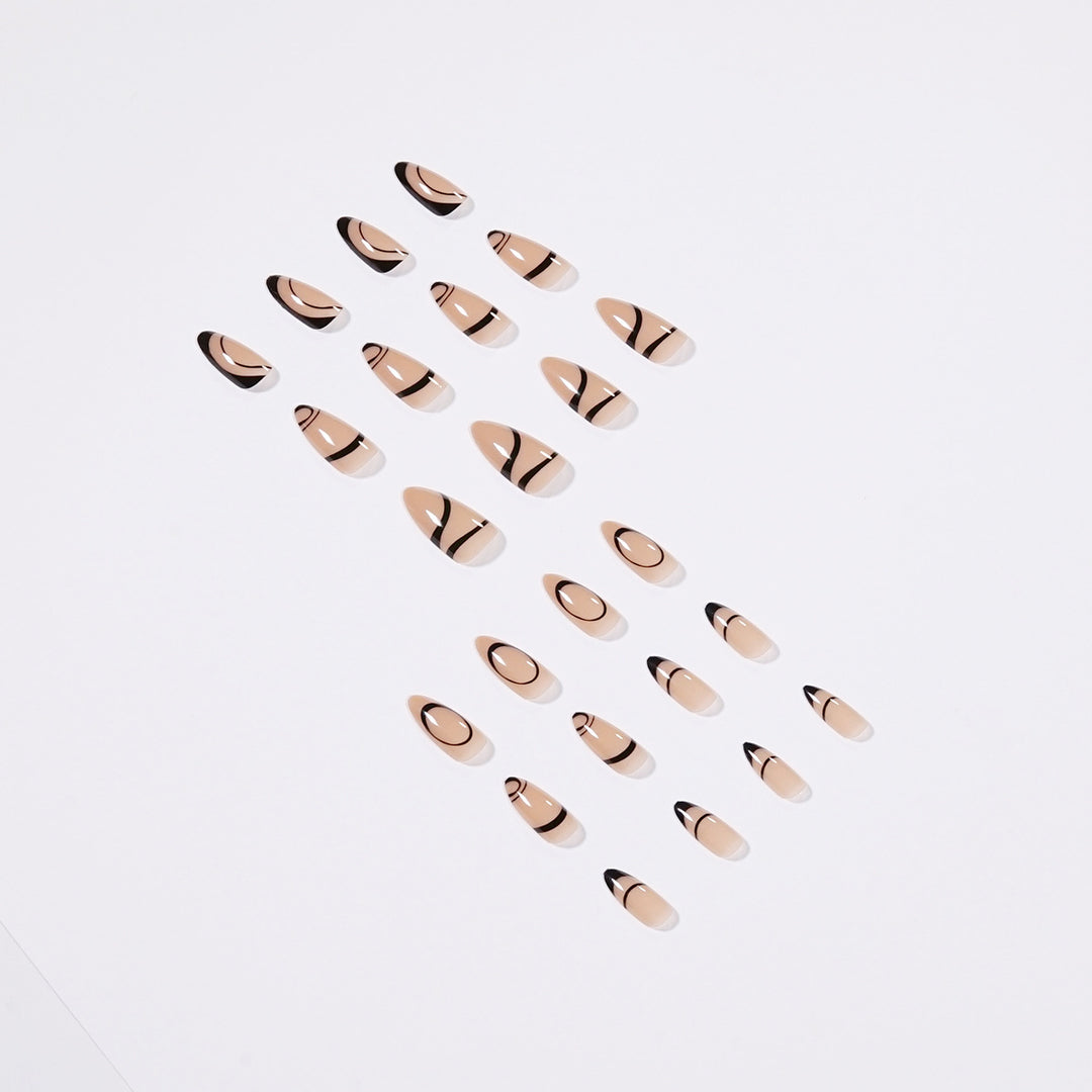 Artful stiletto nails with geometric accents Stornfield