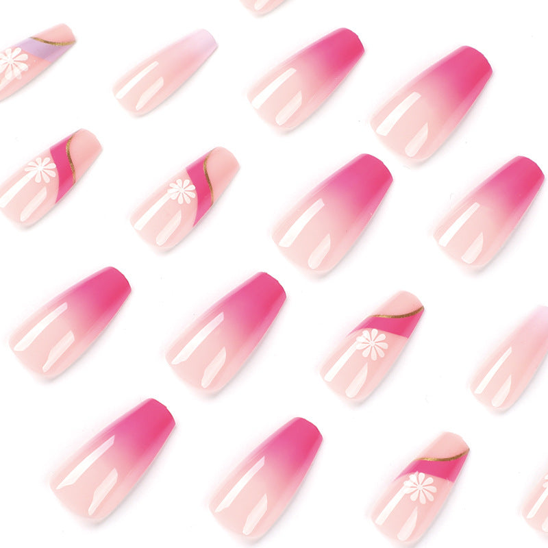 Artful nail extensions with colorful ombre design and floral accents Stornfield