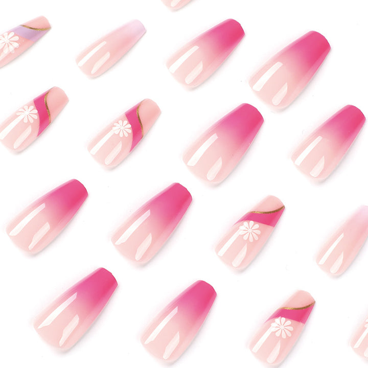 Artful nail extensions with colorful ombre design and floral accents Stornfield