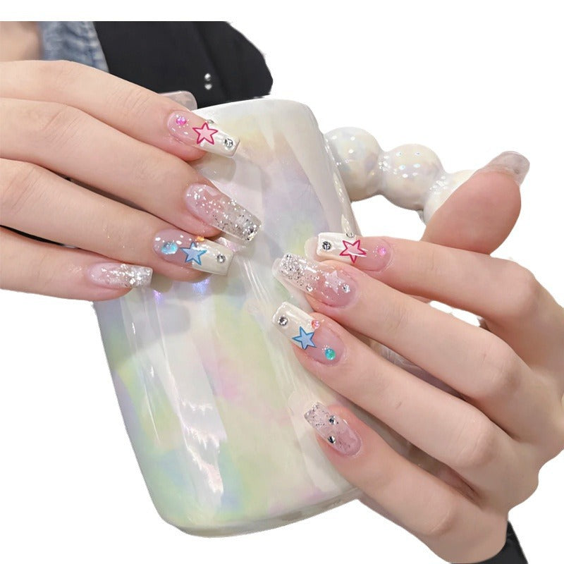 Glamorous artificial nails with heart accents Stornfield