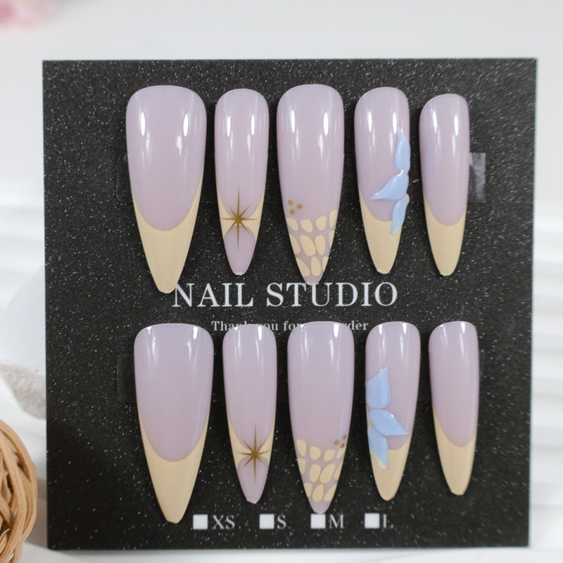 Artificial nail set with elegant floral design and golden accents Stornfield