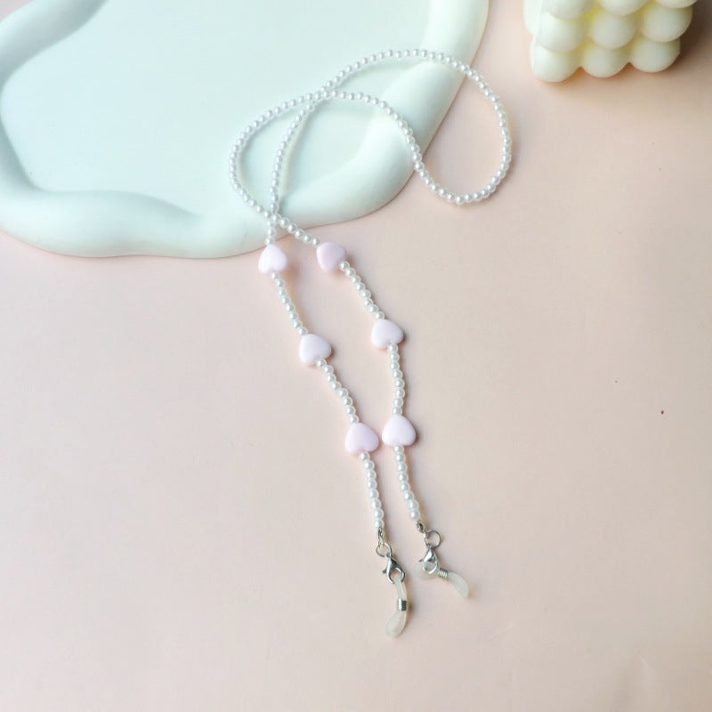 Fashionable pearl necklace with heart pendants Stornfield