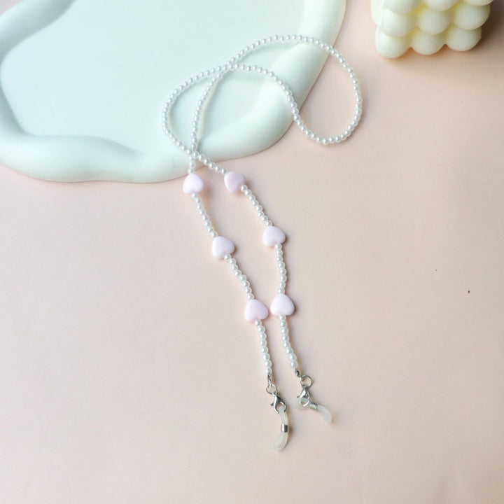 Fashionable pearl necklace with heart pendants Stornfield