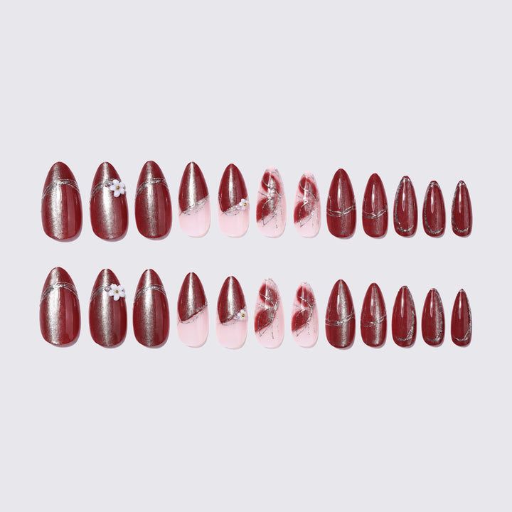 Decorative Press-On Nail Art with Floral Accents Stornfield