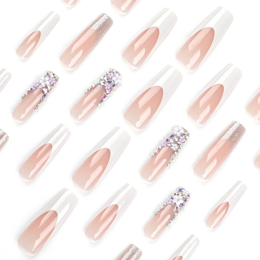 Artful Nail Extensions with Glitter and Flower Decor Stornfield