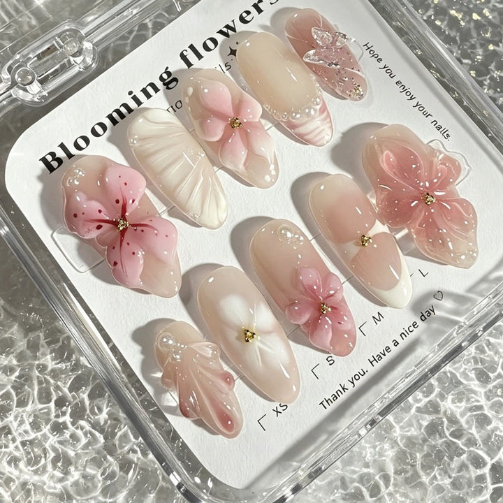 Artificial nail set with floral decorations and 3D accents Stornfield