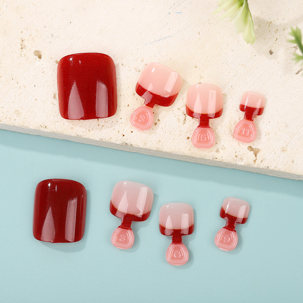 Acrylic nail set in elegant red and nude design Stornfield
