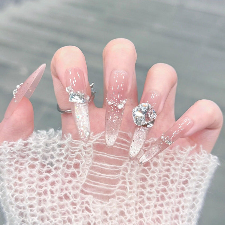 Artificial nails with glitter and crystal embellishments Stornfield