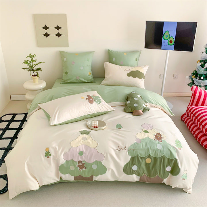 Children's bedding set with playful tree appliqués and soft pillowcases