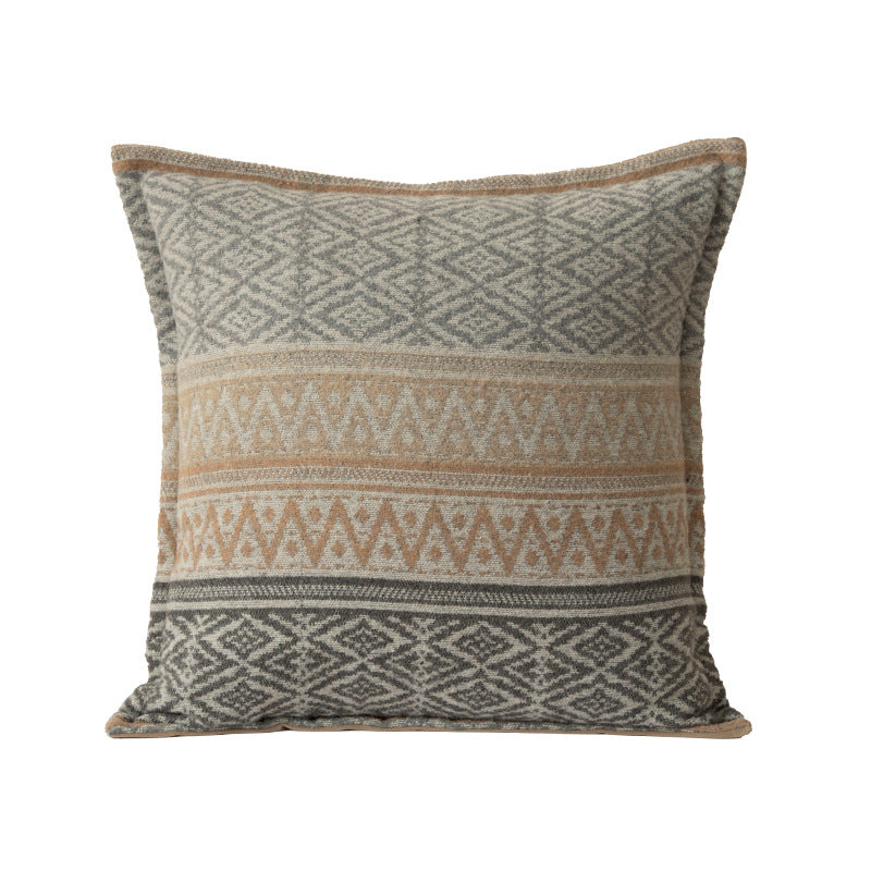 Square decorative sofa cushion with jacquard-woven ornament and soft bouclé surface Stornfield