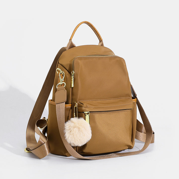 Versatile Multi-Pocket Backpack with Stylish Pom-Pom
