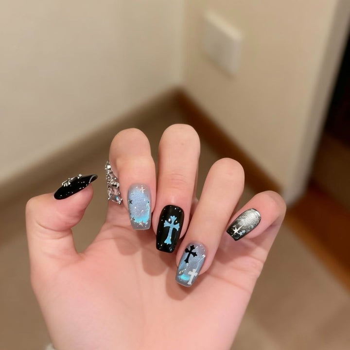 Artistic Press-On Nail Art with Cross and Star Designs