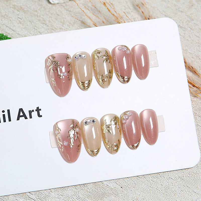 Artificial Nail Set with Elegant Gold Accent and Rhinestone Decorations Stornfield