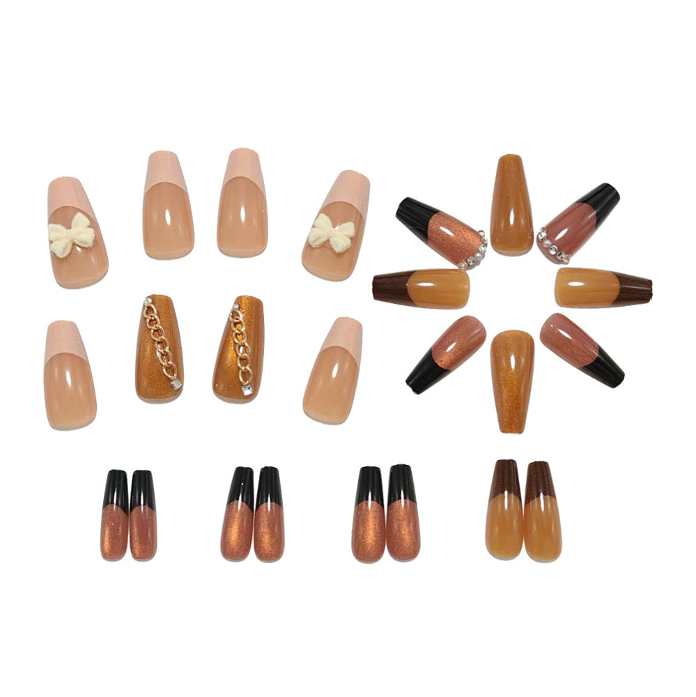 Glamorous artificial nails with glittering design and elegant embellishments Stornfield