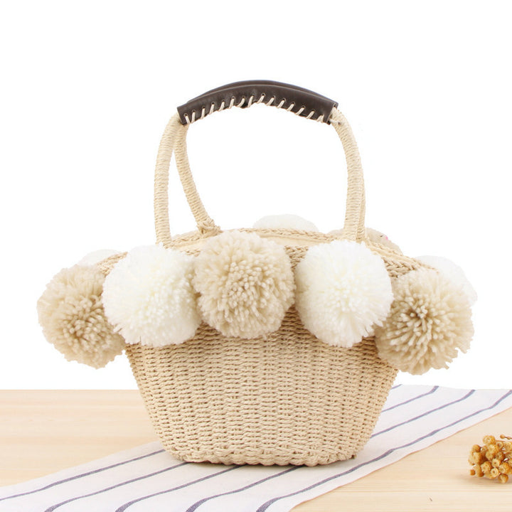 Basket bag with decorative pompons Stornfield