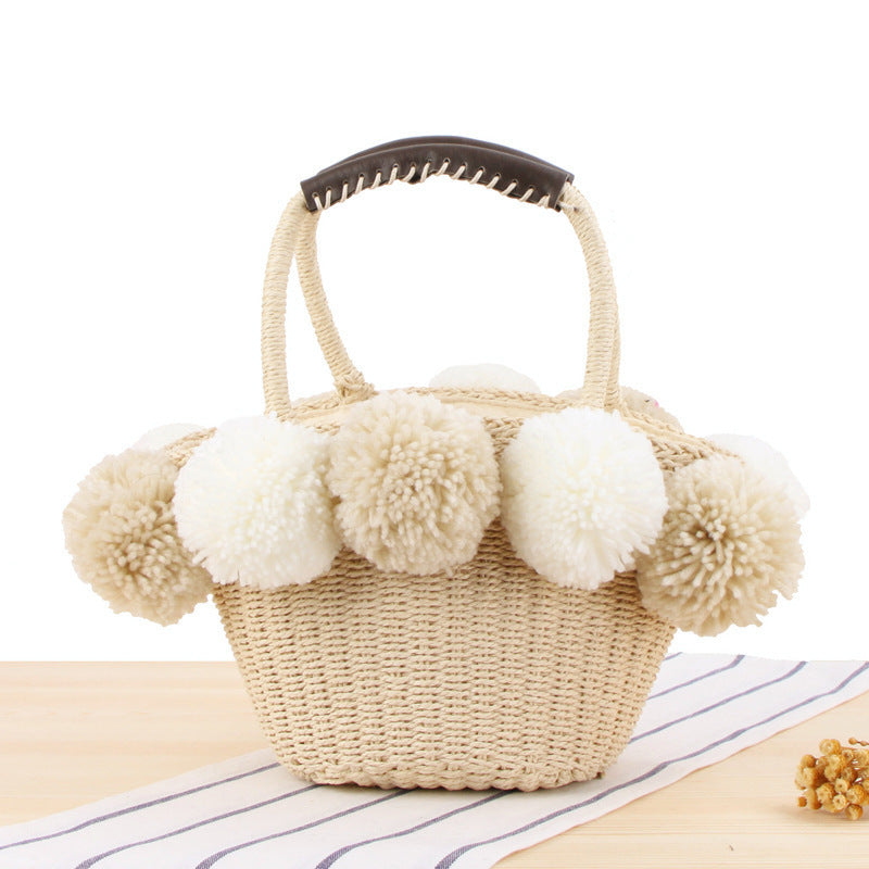 Basket bag with pompom decorated top edge Stornfield