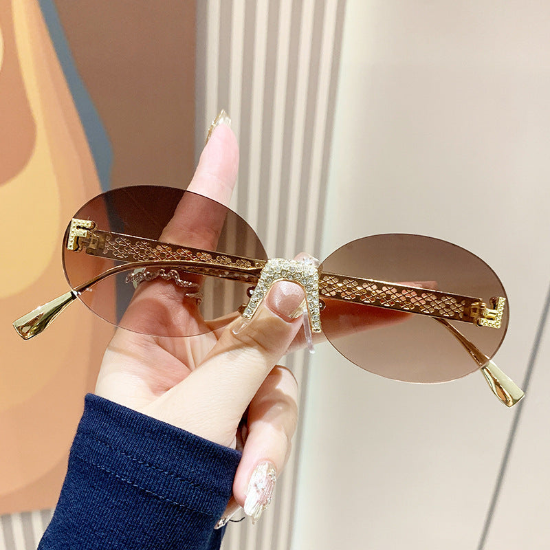 Women's sunglasses with glittering frame and oval lenses Stornfield