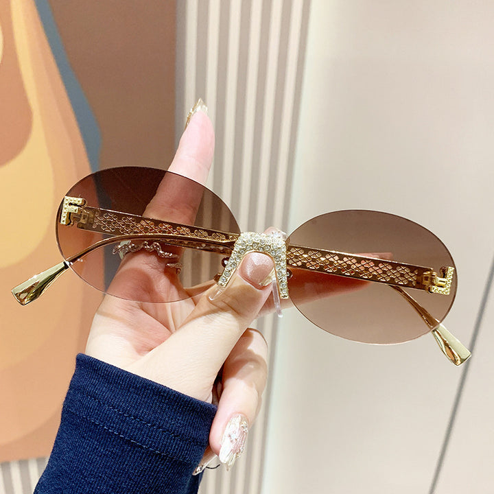 Women's sunglasses with glittering frame and oval lenses Stornfield