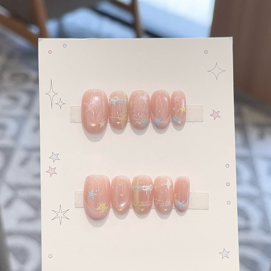 Artificial nails with romantic star and glitter motifs Stornfield