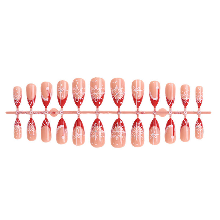 Artificial nail set with festive winter motifs and elegant accents Stornfield