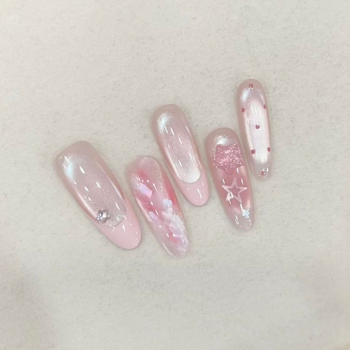 Artificial nails with delicate glitter and star motifs Stornfield