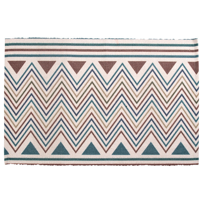 Flat-woven kilim rug with geometric ethnic pattern